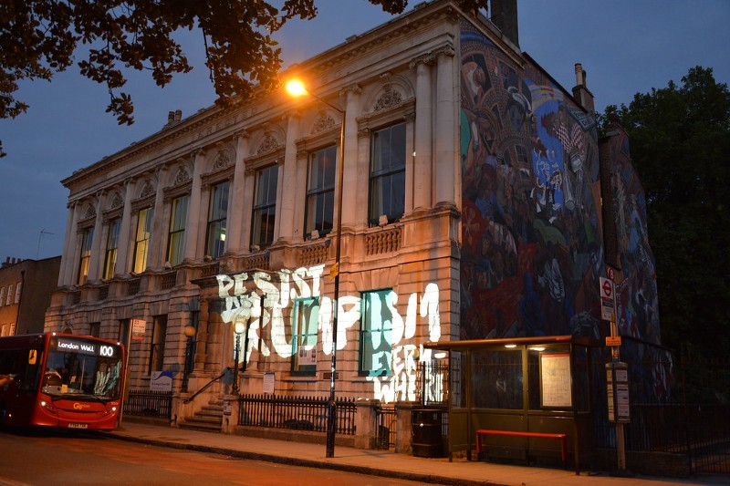 “Resist Trumpism” projected on building